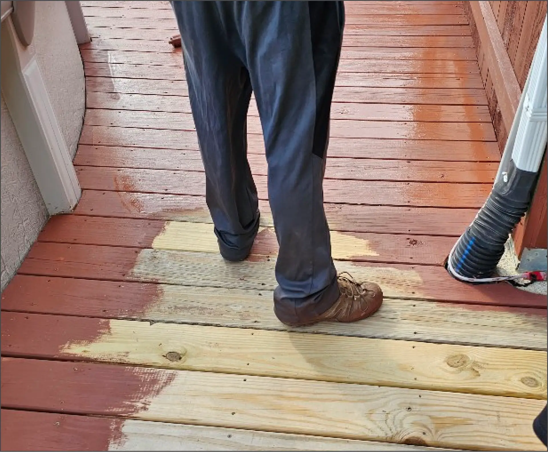 A man stand on stained deck.